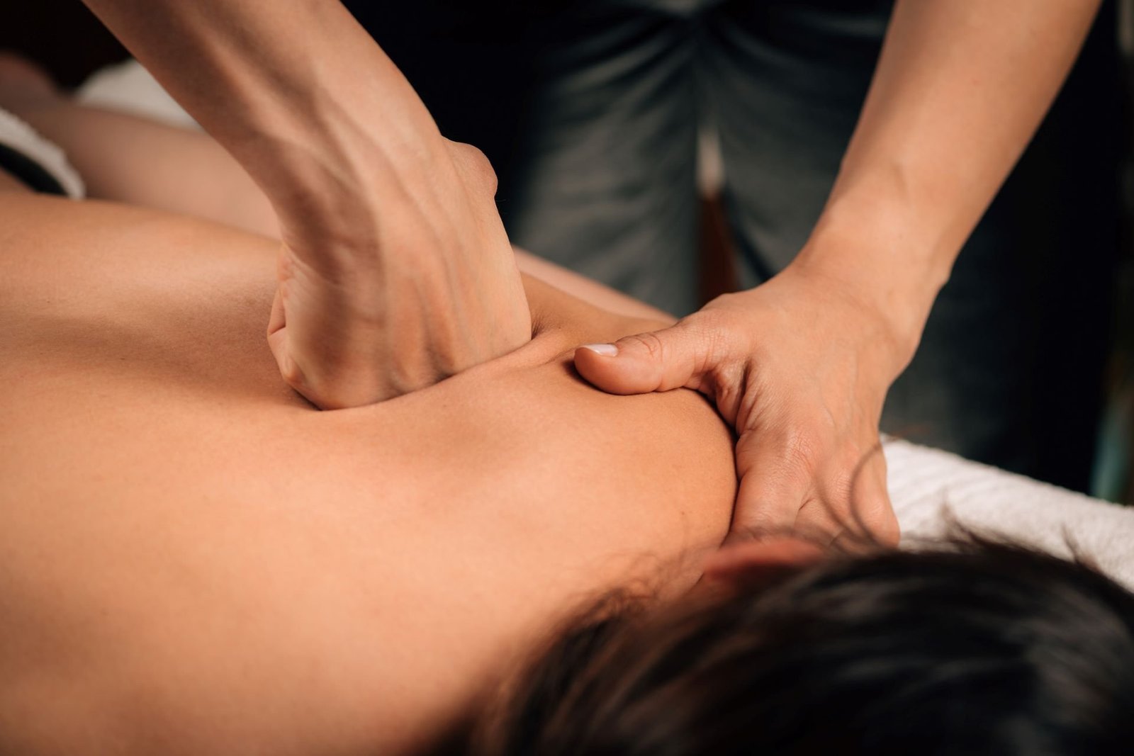 Deep tissue massage therapy for muscle pain relief at Mass  Spa Pondicherry